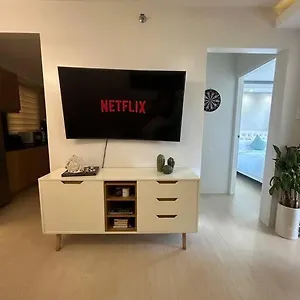 Modern Oasis: Pool + Netflix Apartment Manila